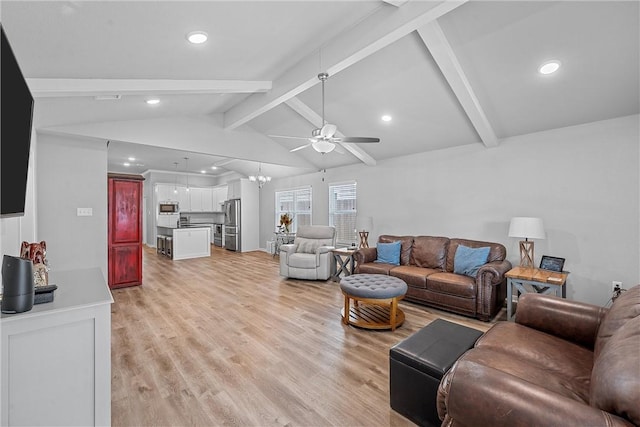 living room with ceiling fan, lofted ceiling with beams, and light hardwood / wood-style floors