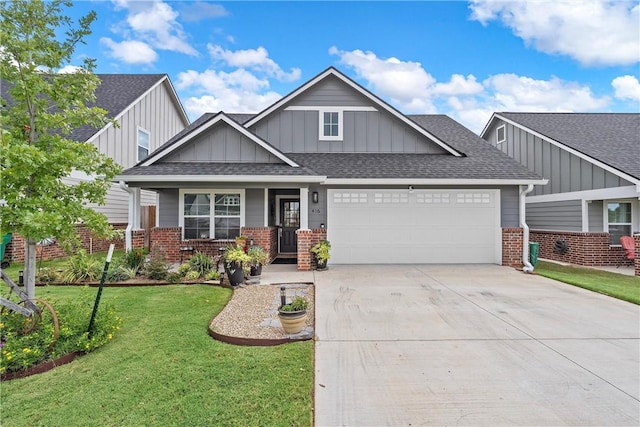 craftsman-style house featuring a garage, a front lawn, and covered porch