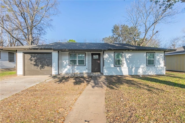 single story home featuring a garage and a front yard