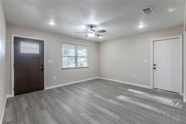 foyer featuring ceiling fan and hardwood / wood-style floors