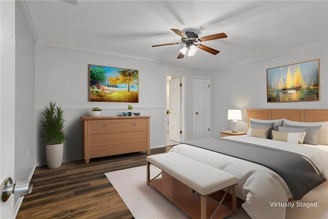 bedroom featuring dark hardwood / wood-style floors, ceiling fan, and crown molding