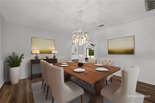 dining space with a notable chandelier, ornamental molding, and dark wood-type flooring