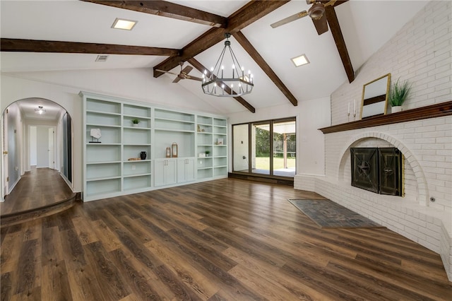 unfurnished living room with vaulted ceiling with beams, dark hardwood / wood-style flooring, a fireplace, and ceiling fan with notable chandelier