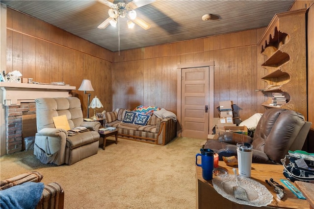 interior space featuring ceiling fan and wood walls