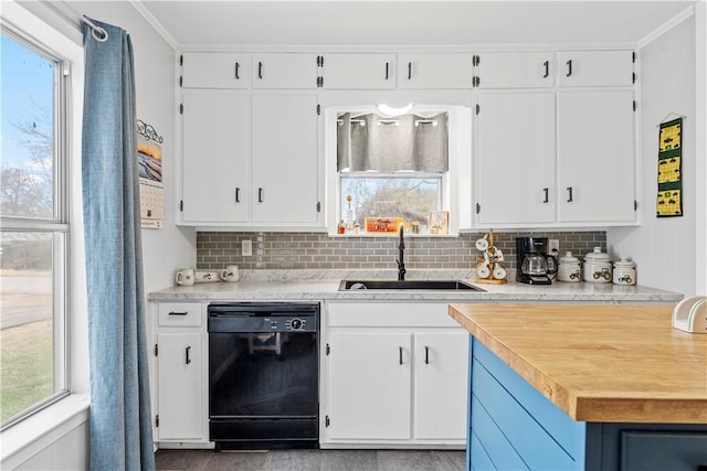 kitchen featuring sink, dishwasher, white cabinetry, ornamental molding, and decorative backsplash