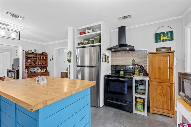 kitchen with blue cabinets, wooden counters, a kitchen island, stainless steel appliances, and wall chimney range hood