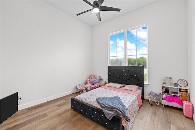 bedroom featuring ceiling fan and wood-type flooring