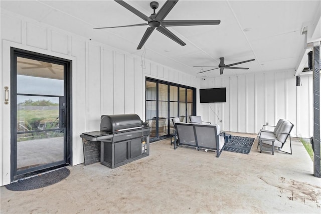 view of patio with grilling area and ceiling fan