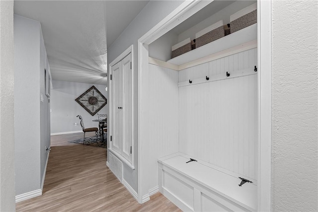 mudroom with light wood-type flooring