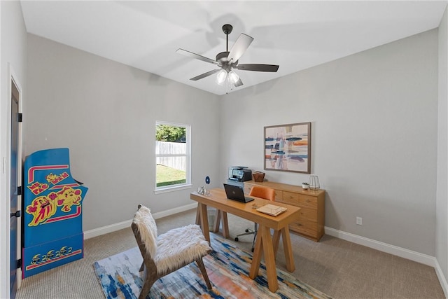 office space with ceiling fan and carpet floors