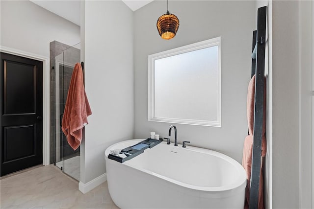 bathroom with tile patterned floors and plus walk in shower