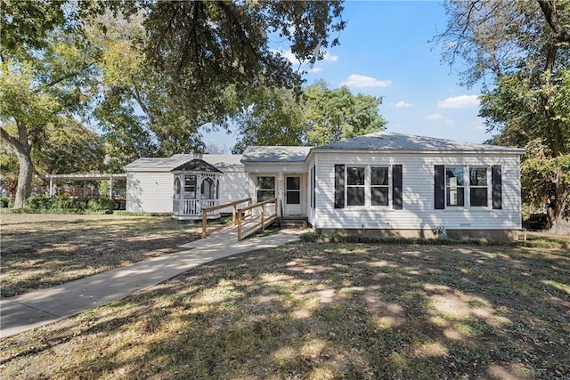 ranch-style house with a front yard