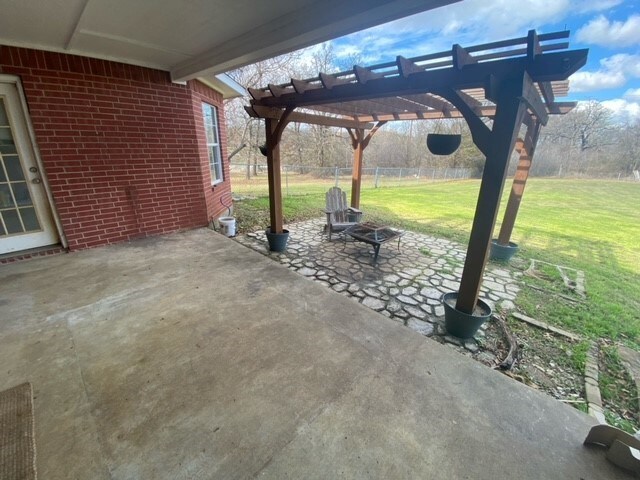 view of patio / terrace featuring a pergola