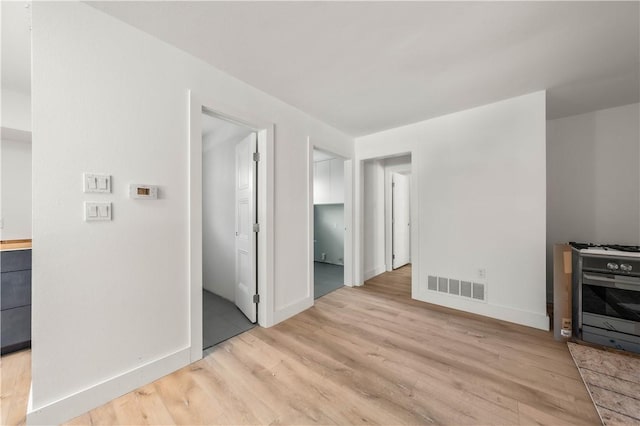 living room with light hardwood / wood-style flooring