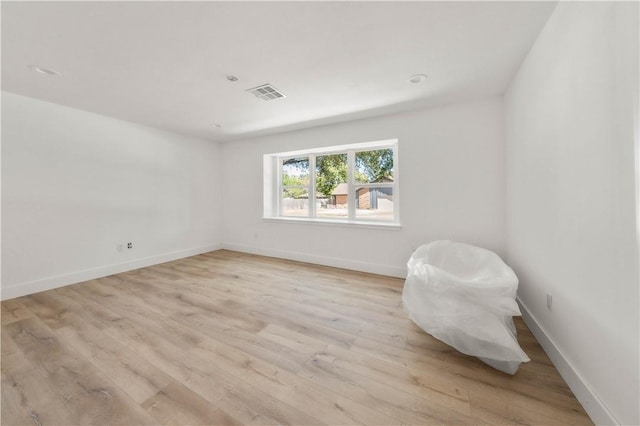 empty room featuring light hardwood / wood-style flooring