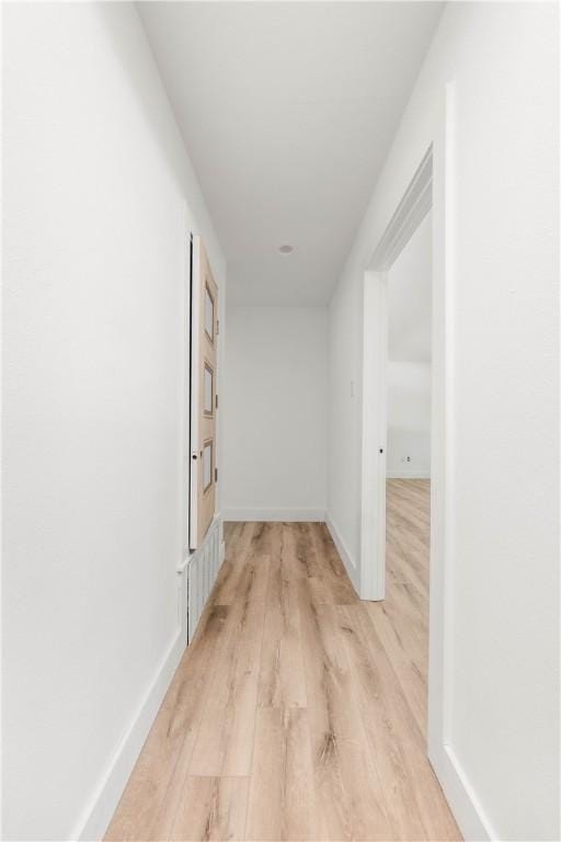 hall featuring light hardwood / wood-style flooring