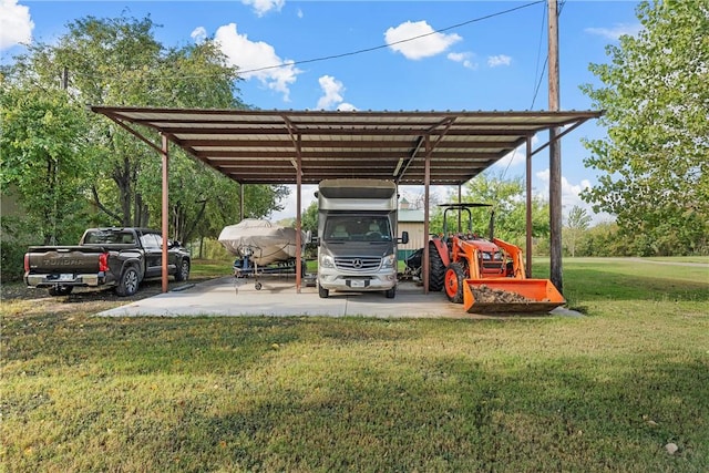 view of parking / parking lot with a carport and a lawn