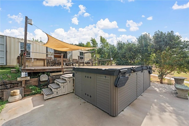 view of patio / terrace featuring a hot tub