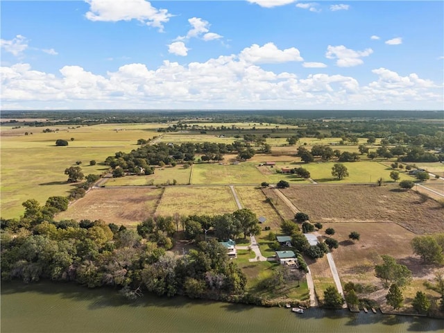 bird's eye view featuring a rural view and a water view