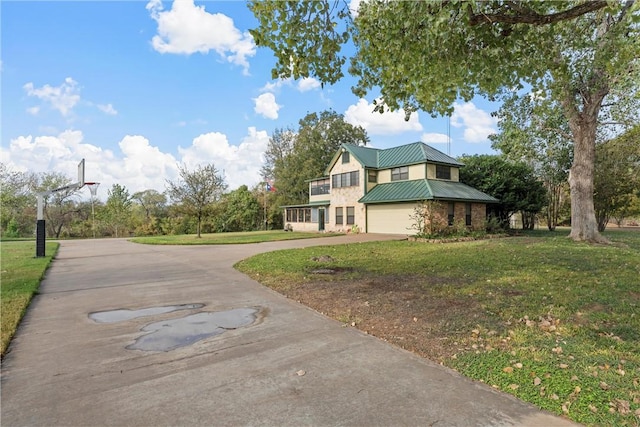 exterior space with a front yard