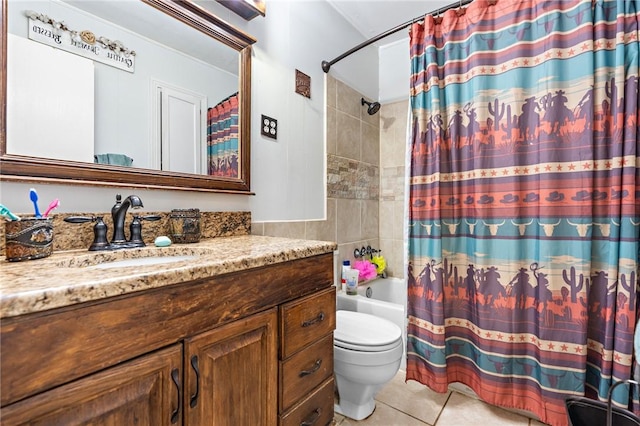 full bathroom with tile patterned floors, shower / bath combo with shower curtain, vanity, and toilet