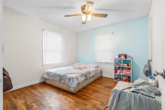 bedroom featuring ceiling fan and wood-type flooring