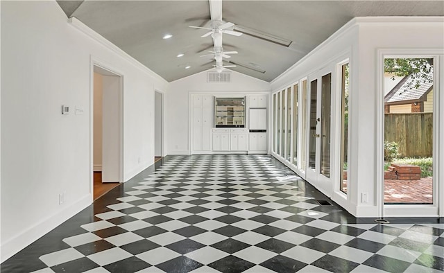 corridor with vaulted ceiling and ornamental molding