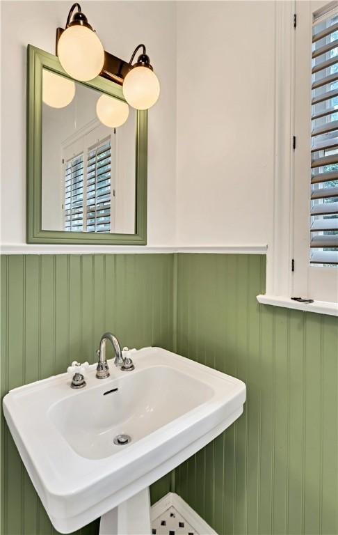 bathroom with a wealth of natural light and sink