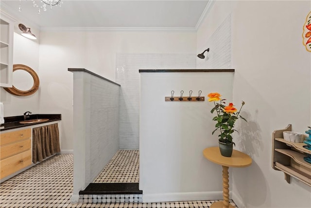 mudroom with ornamental molding and sink