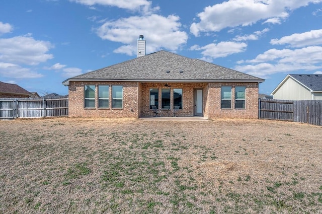 rear view of property with a patio