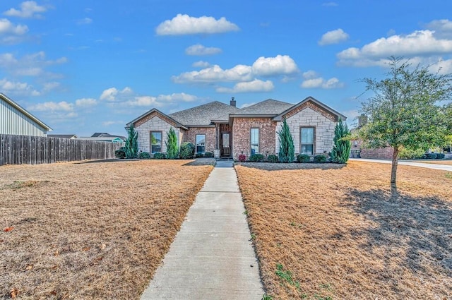 view of front of home with a front yard