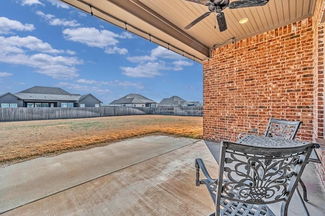 view of patio / terrace featuring ceiling fan