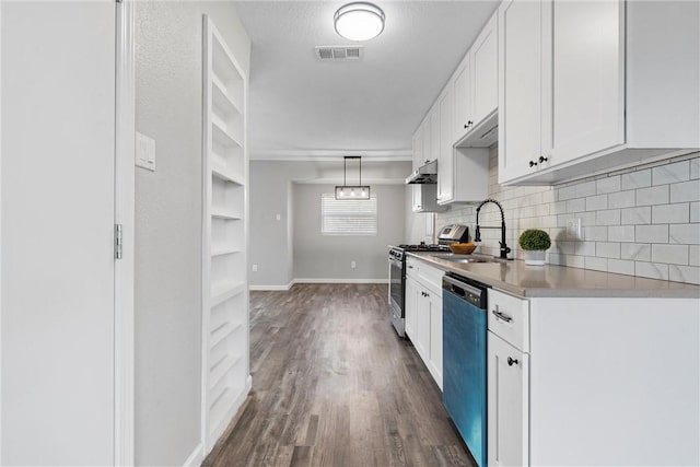 kitchen with visible vents, stainless steel range with gas stovetop, a sink, white cabinets, and dishwashing machine