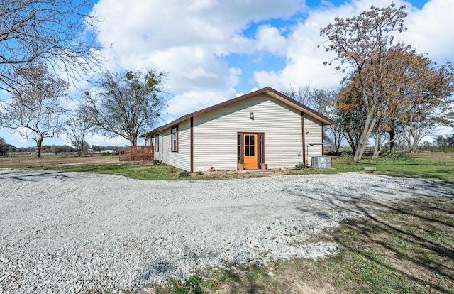 back of property with central AC unit