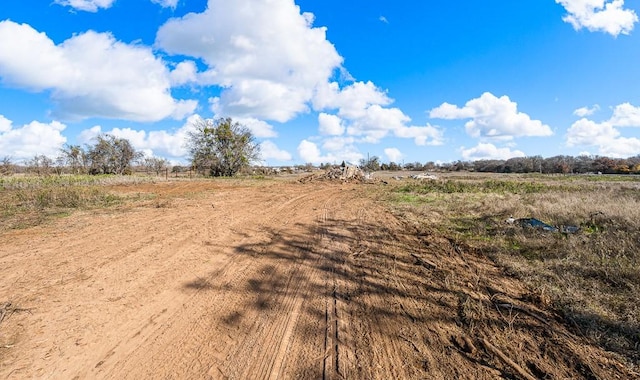 exterior space with a rural view