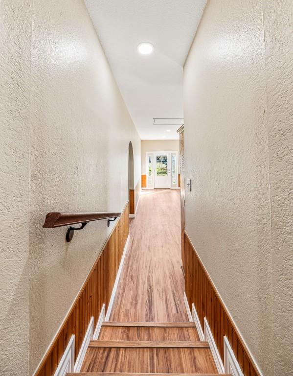 hallway featuring hardwood / wood-style flooring