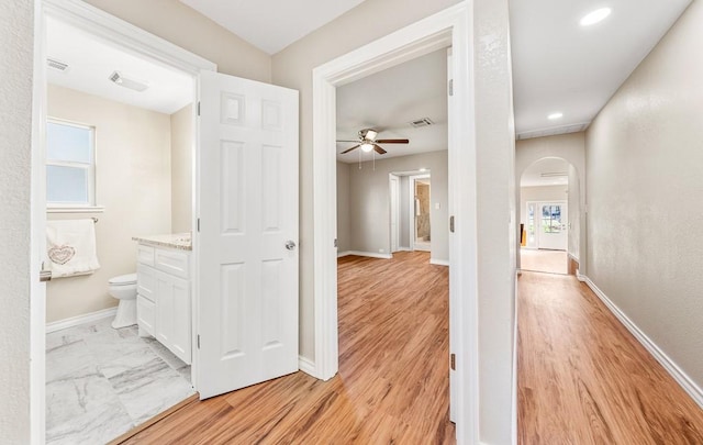 hallway featuring light hardwood / wood-style flooring