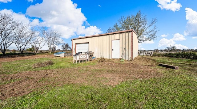 view of outbuilding with a garage