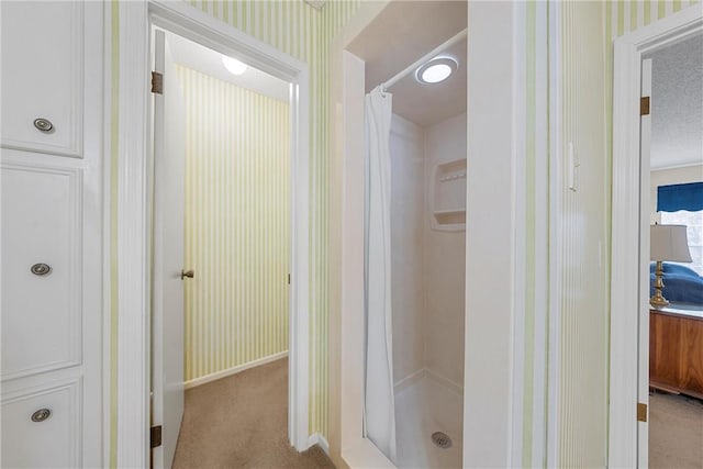 bathroom with a shower with curtain