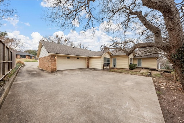 ranch-style home with a garage