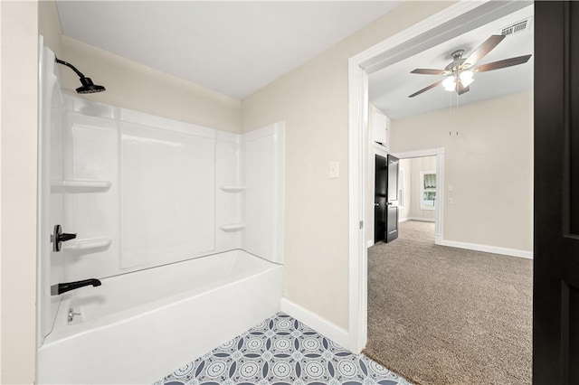 bathroom featuring ceiling fan and shower / bath combination