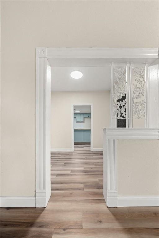 hallway featuring hardwood / wood-style floors