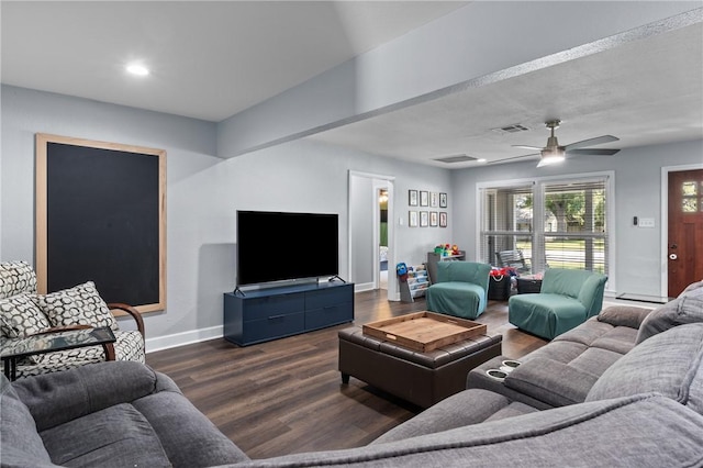 living room featuring baseboards, visible vents, a ceiling fan, dark wood-style floors, and recessed lighting