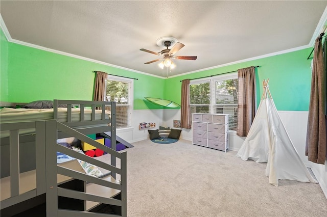 bedroom with carpet, multiple windows, and crown molding