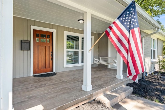 entrance to property with covered porch