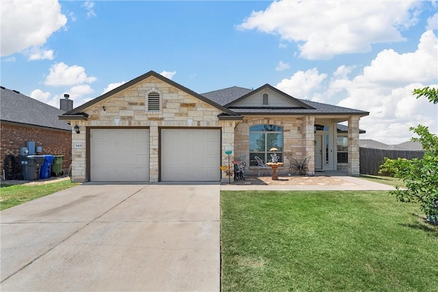 ranch-style house with a front yard and a garage