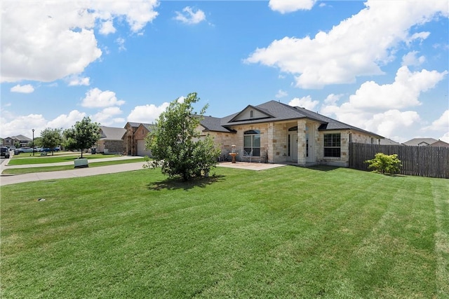 view of front of home with a front lawn