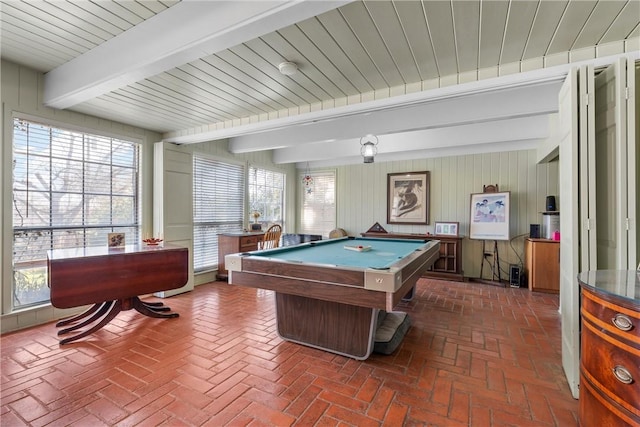 rec room with brick floor, beam ceiling, and billiards