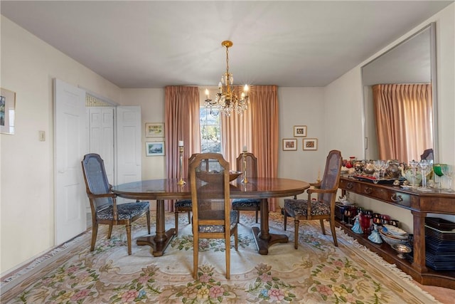 dining room featuring a chandelier