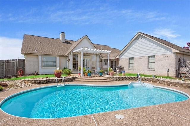 view of pool featuring a pergola and a patio area